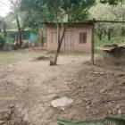 Terreno con casita de ladrillo rojo en Barrio Nuevo Rivas